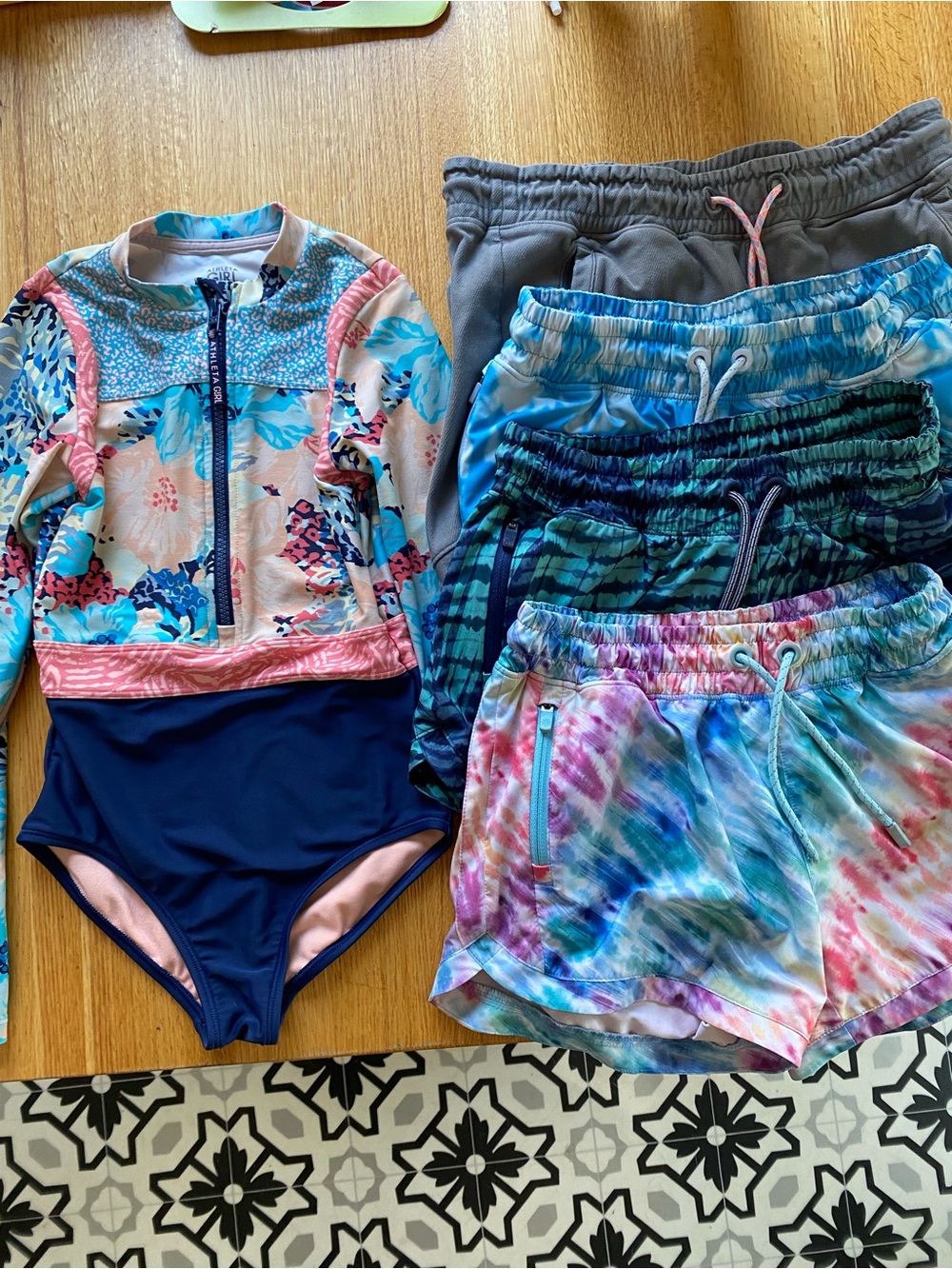 Athleta Girl swimsuit and shorts bundle